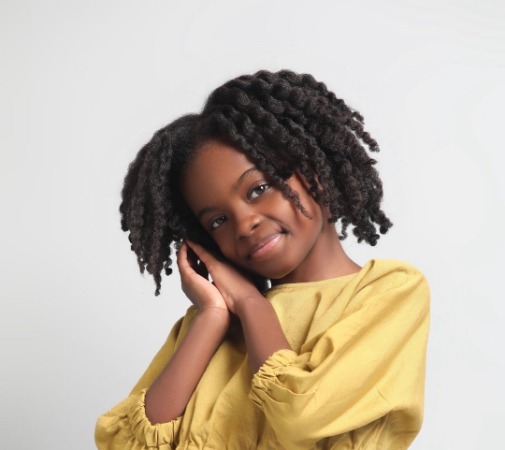 Melody Hurd posing for the photo.